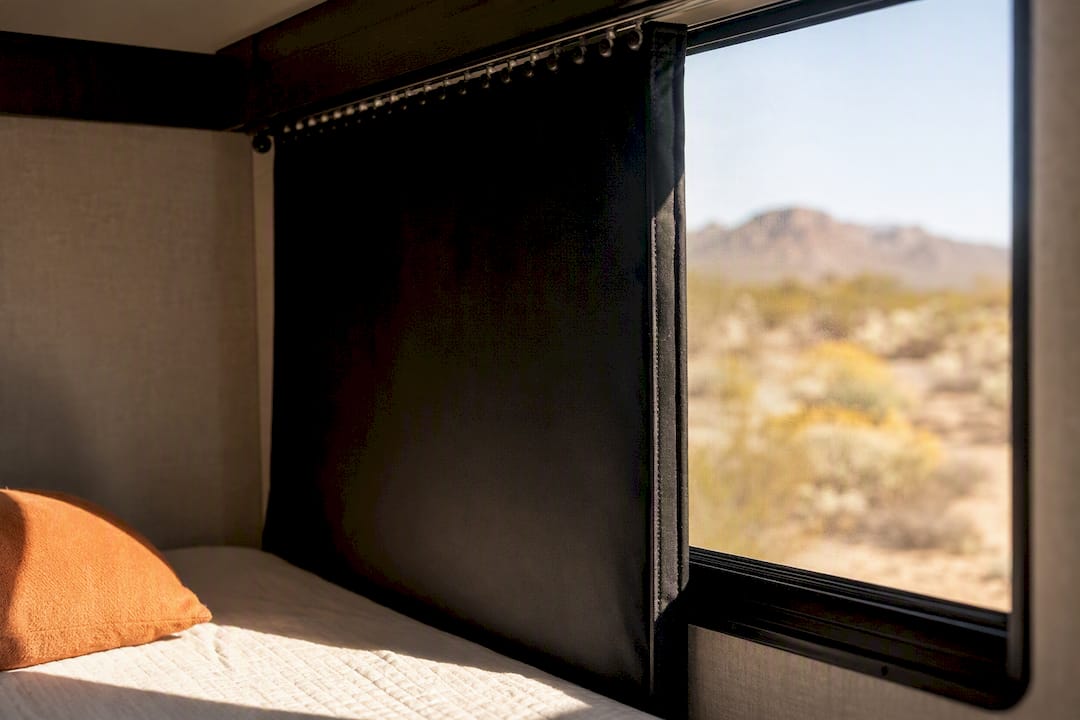 Blackout curtain covering an RV window
