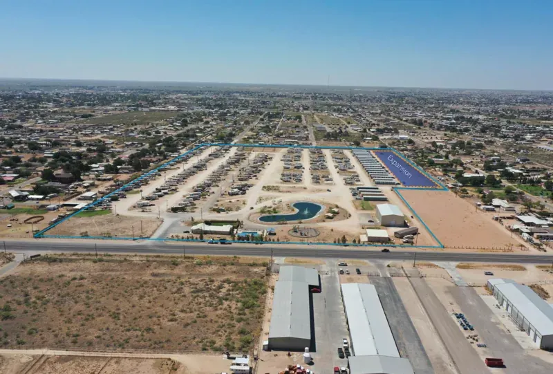 Aerial view of the property. The blue outline marks our boundary; the shaded area is land held for future expansion and is not currently rentable at Mesquite Oasis Lodge & RV Park in Odessa, Texas