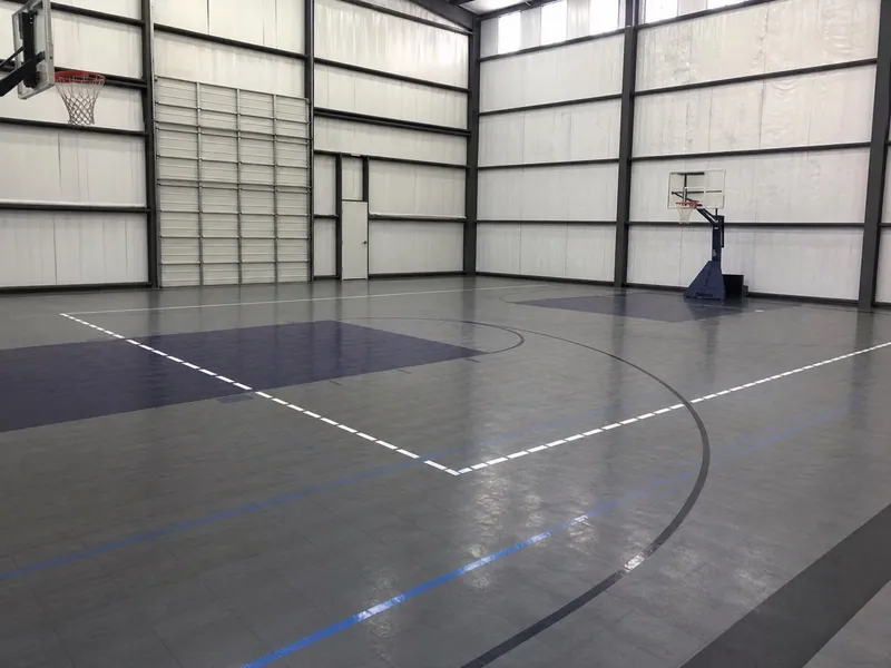 Indoor basketball and volleyball court at Mesquite Oasis Lodge & RV Park in Odessa, Texas