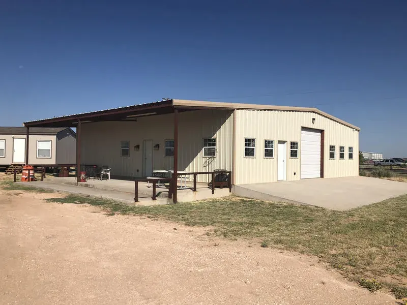 Park office and clubhouse building at Mesquite Oasis Lodge & RV Park in Odessa, Texas
