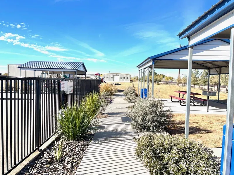Lit walking path at Mesquite Oasis Lodge & RV Park in Odessa, Texas