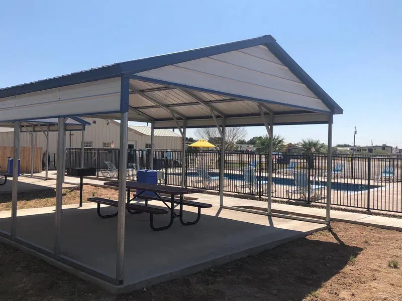Covered pavilion at Mesquite Oasis Lodge & RV Park in Odessa, Texas