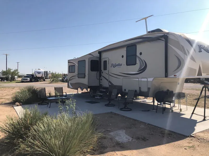 30 amp RV site with concrete pad at Mesquite Oasis RV Park in Odessa